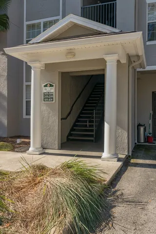 a view of house with garage