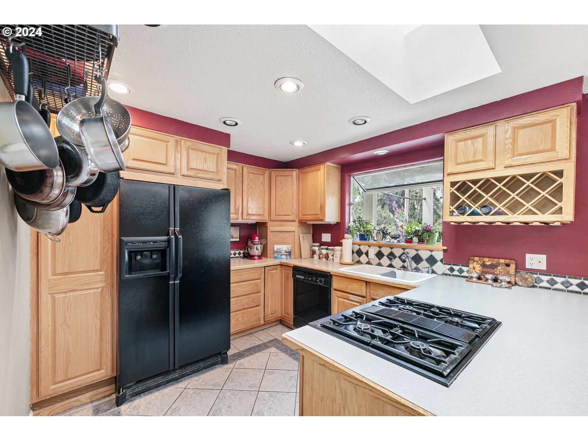 2990 Hyacinth Street Eugene, OR 97404 - Photo 24 of 47 a kitchen with stainless steel appliances granite countertop a refrigerator and a stove
