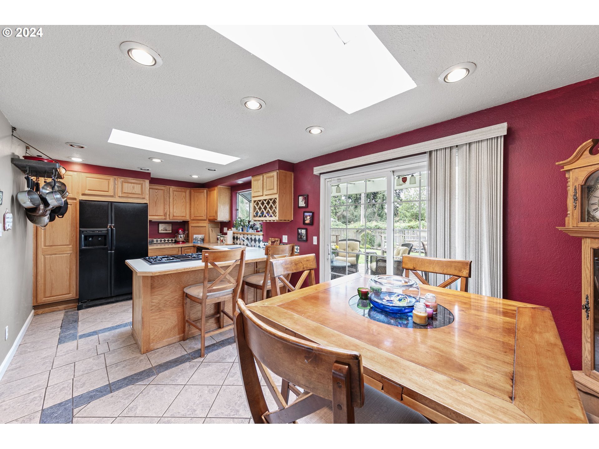 2990 Hyacinth Street Eugene, OR 97404 - Photo 26 of 47 a living room with a large window and stainless steel appliances