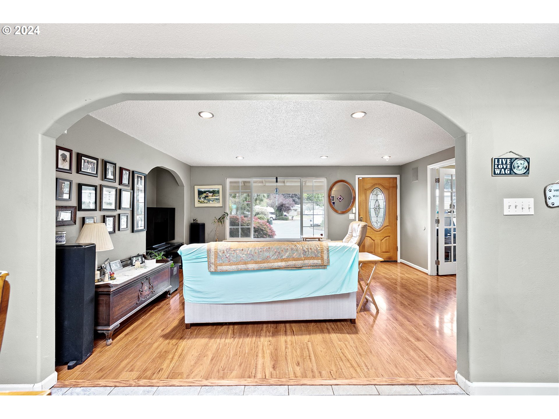 2990 Hyacinth Street Eugene, OR 97404 - Photo 32 of 47 a living room with furniture fireplace and flat screen tv