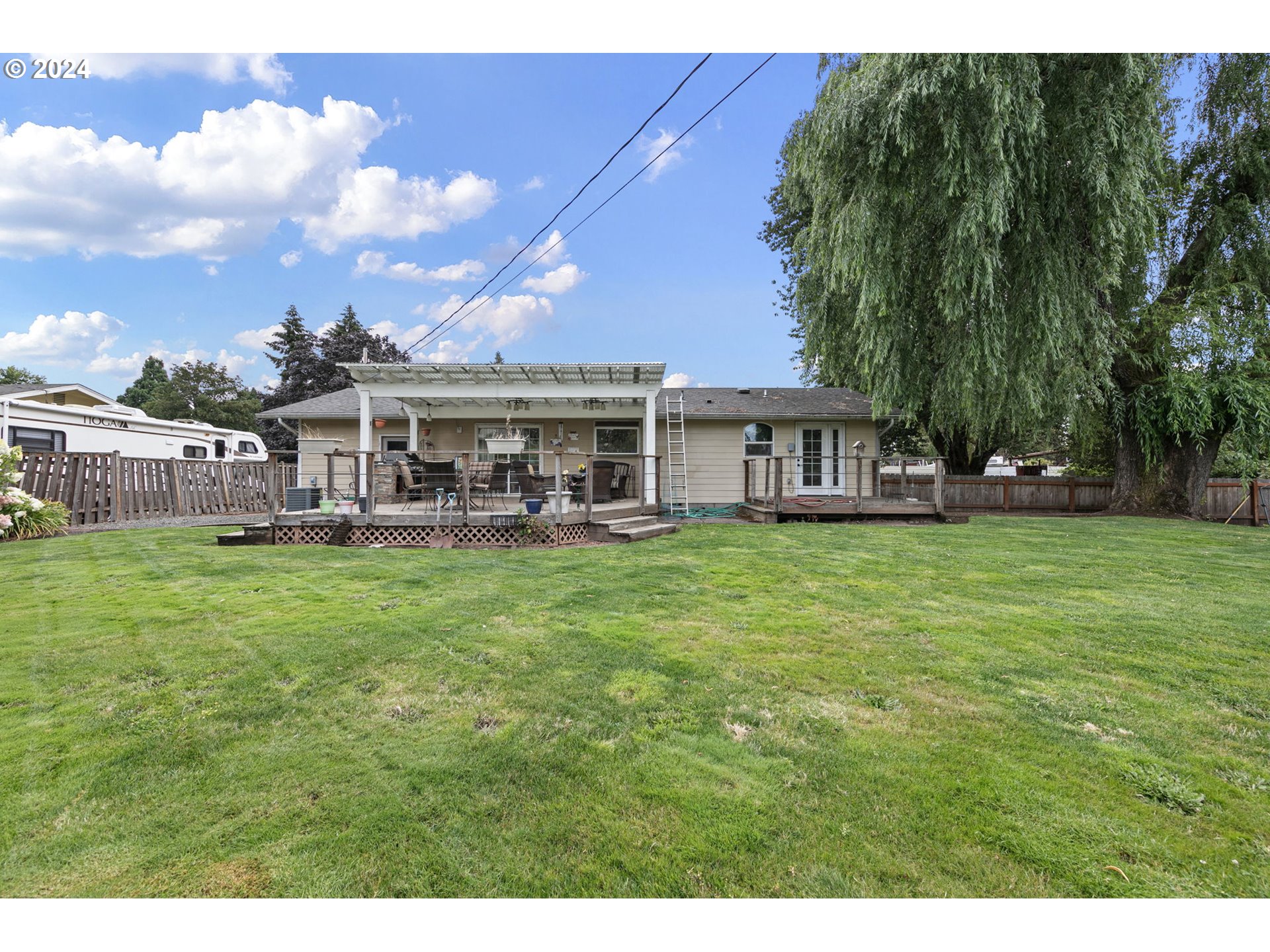 2990 Hyacinth Street Eugene, OR 97404 - Photo 40 of 47 a view of a house with a backyard porch and sitting area