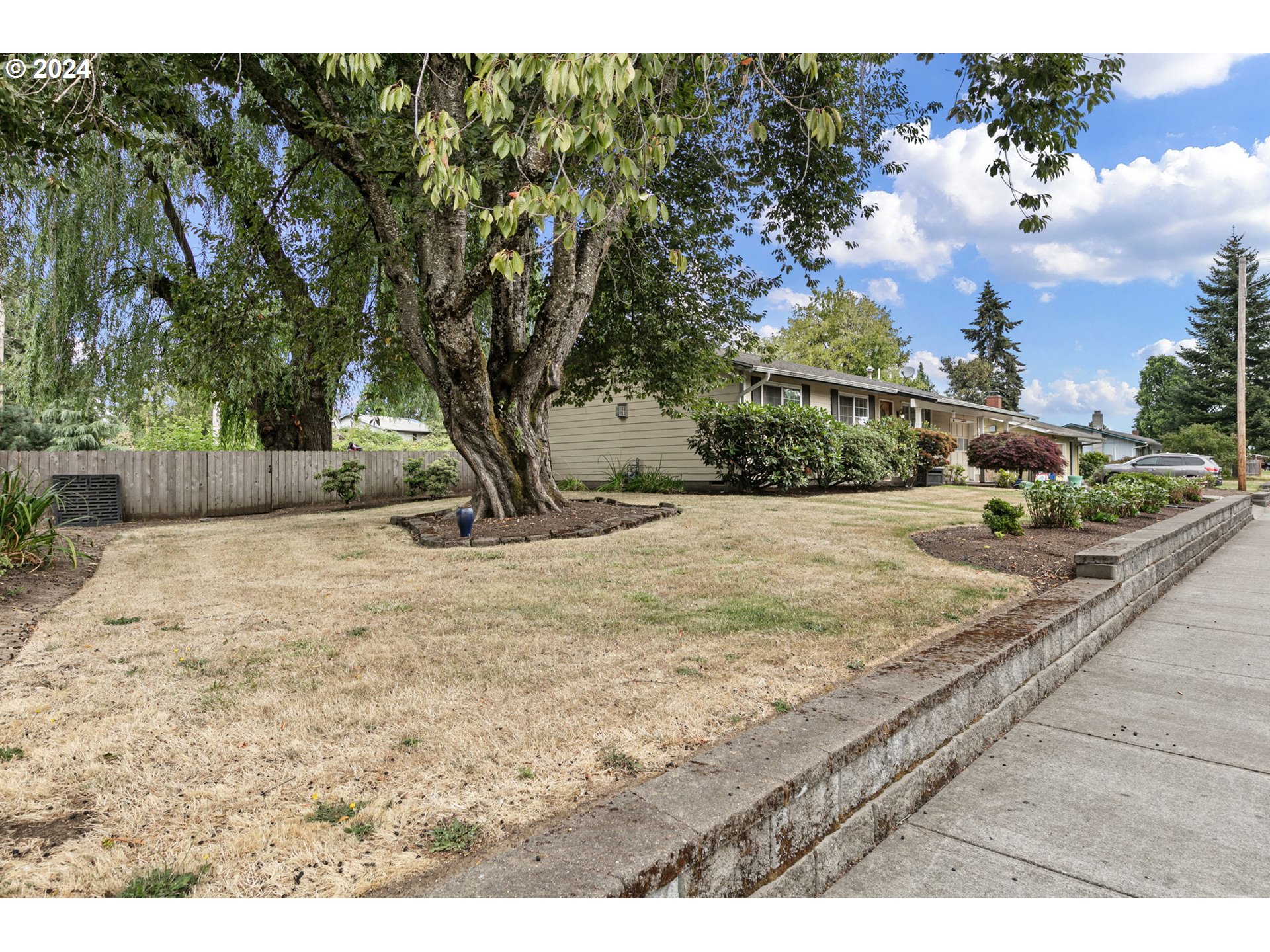 2990 Hyacinth Street Eugene, OR 97404 - Photo 6 of 47 a view of a backyard of the house