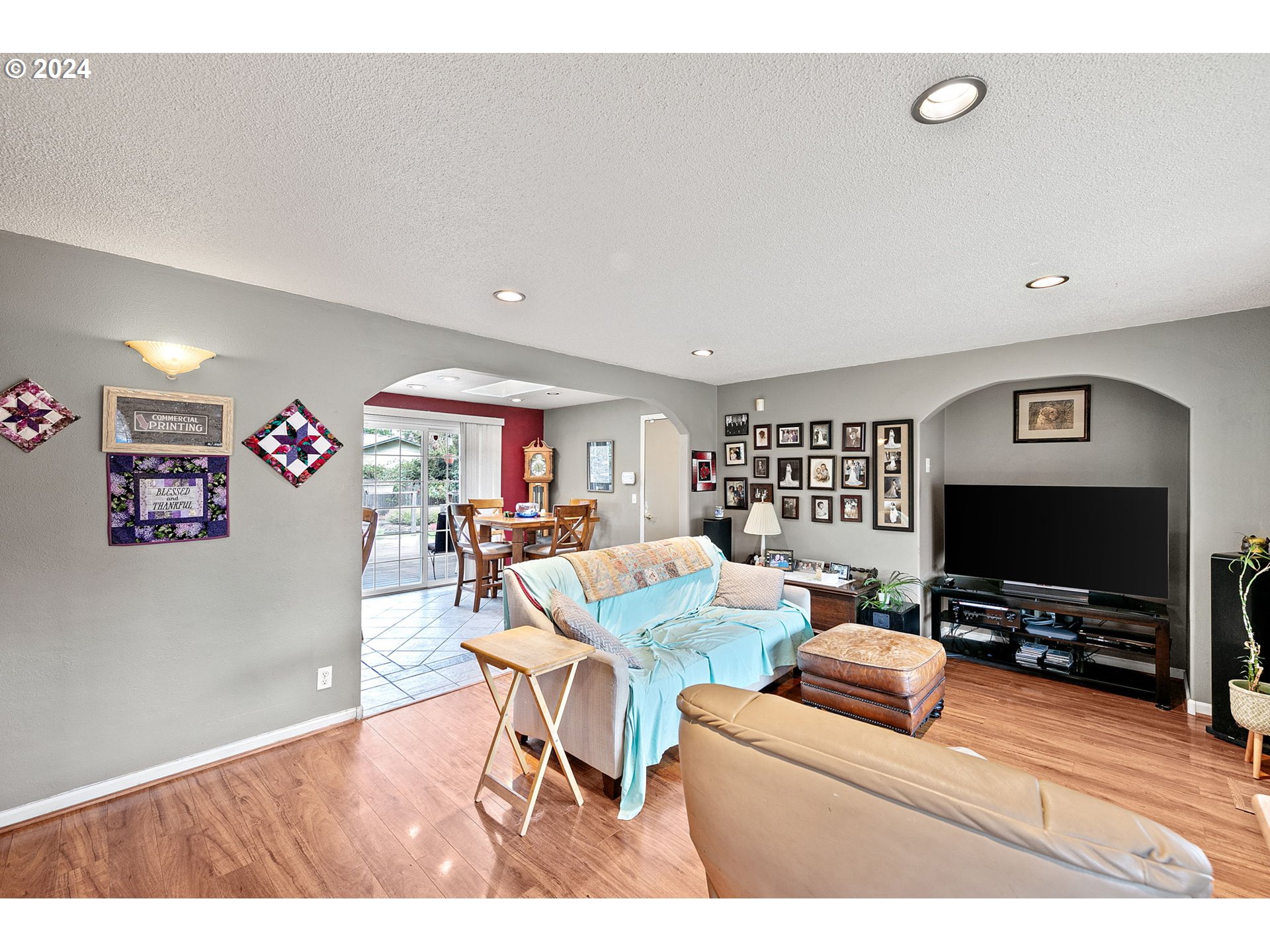 2990 Hyacinth Street Eugene, OR 97404 - Photo 8 of 47 a living room with furniture and a flat screen tv