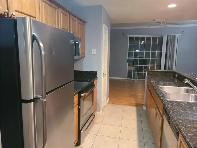 a view of an empty room with empty shelves