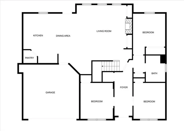 an aerial view of a house with a swimming pool