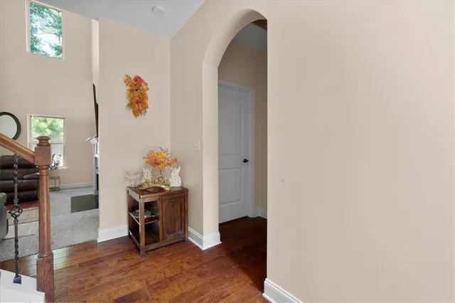 a view of kitchen with furniture and wooden floor