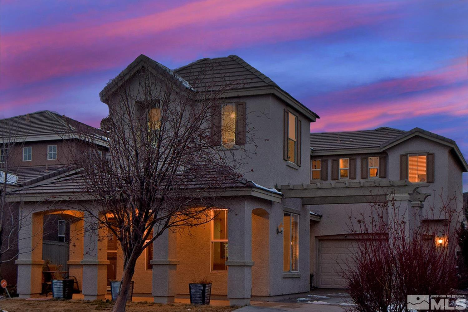 9335 Hummer Court Reno, NV 89521 - Photo 1 of 24 a front view of a house with a yard