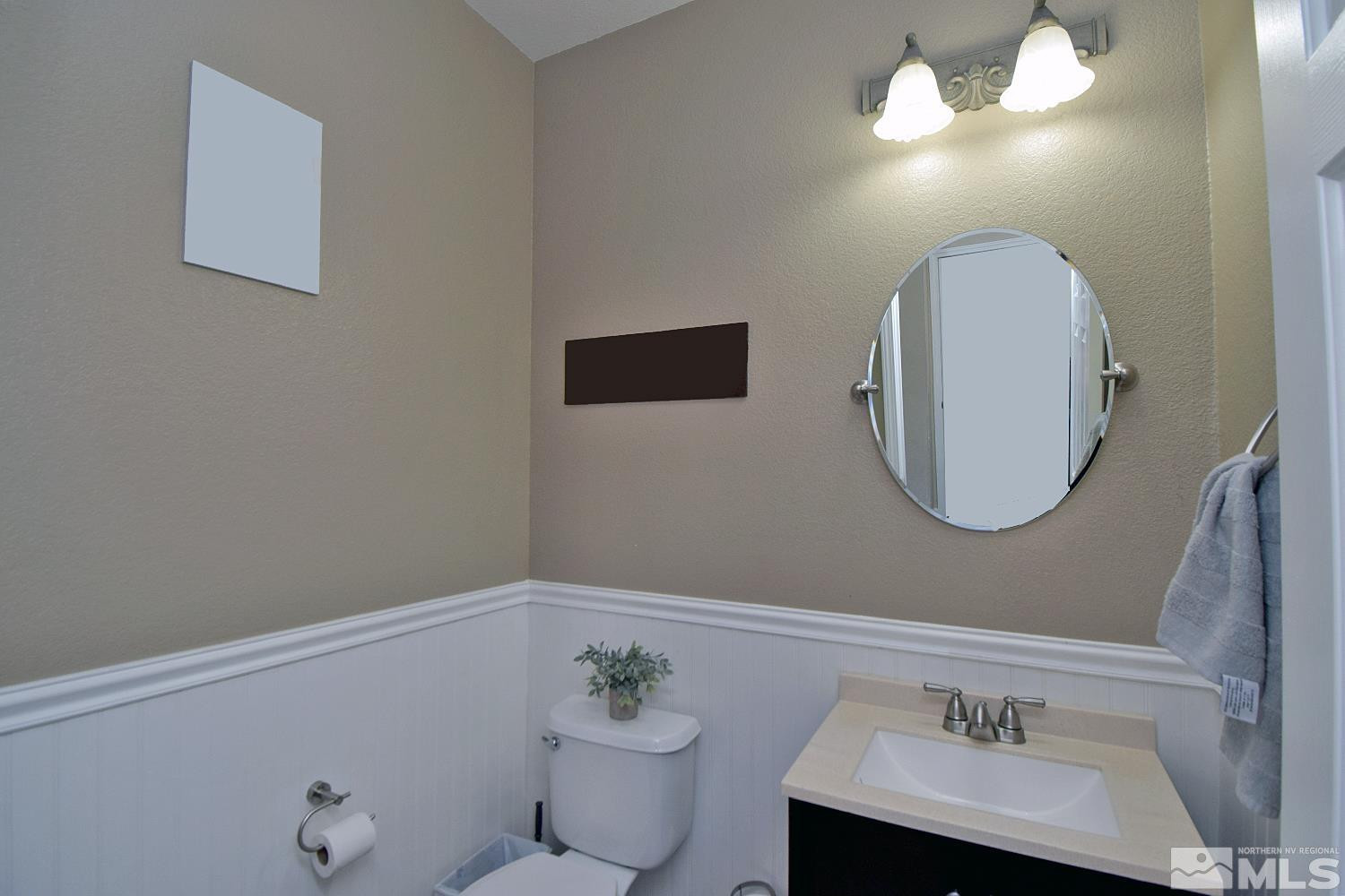 9335 Hummer Court Reno, NV 89521 - Photo 18 of 24 a bathroom with a sink and a mirror