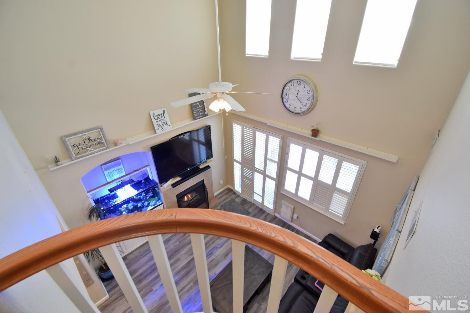 9335 Hummer Court Reno, NV 89521 - Photo 19 of 24 a view of living room with furniture and a flat screen tv