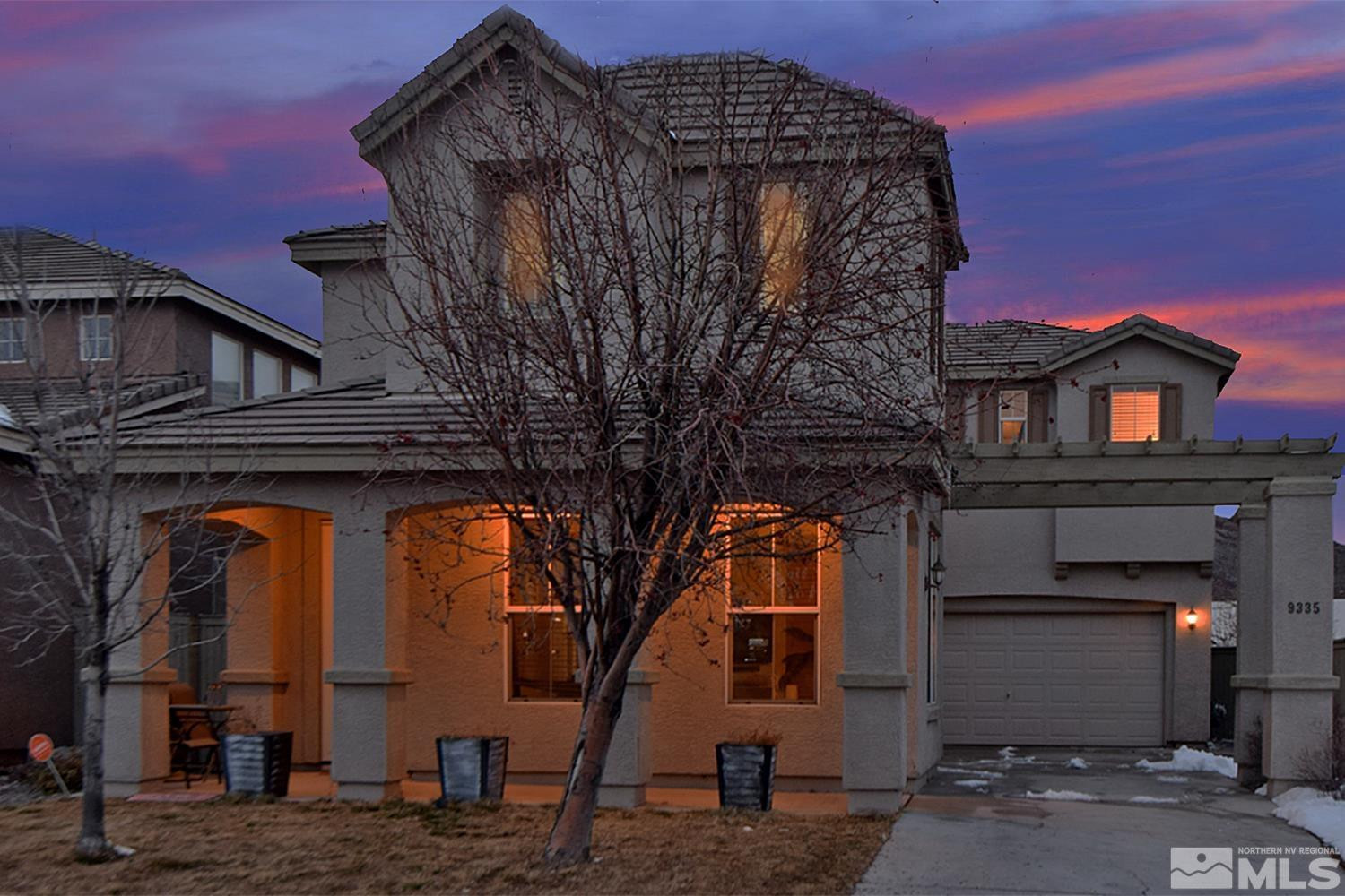 9335 Hummer Court Reno, NV 89521 - Photo 2 of 24 a front view of a house