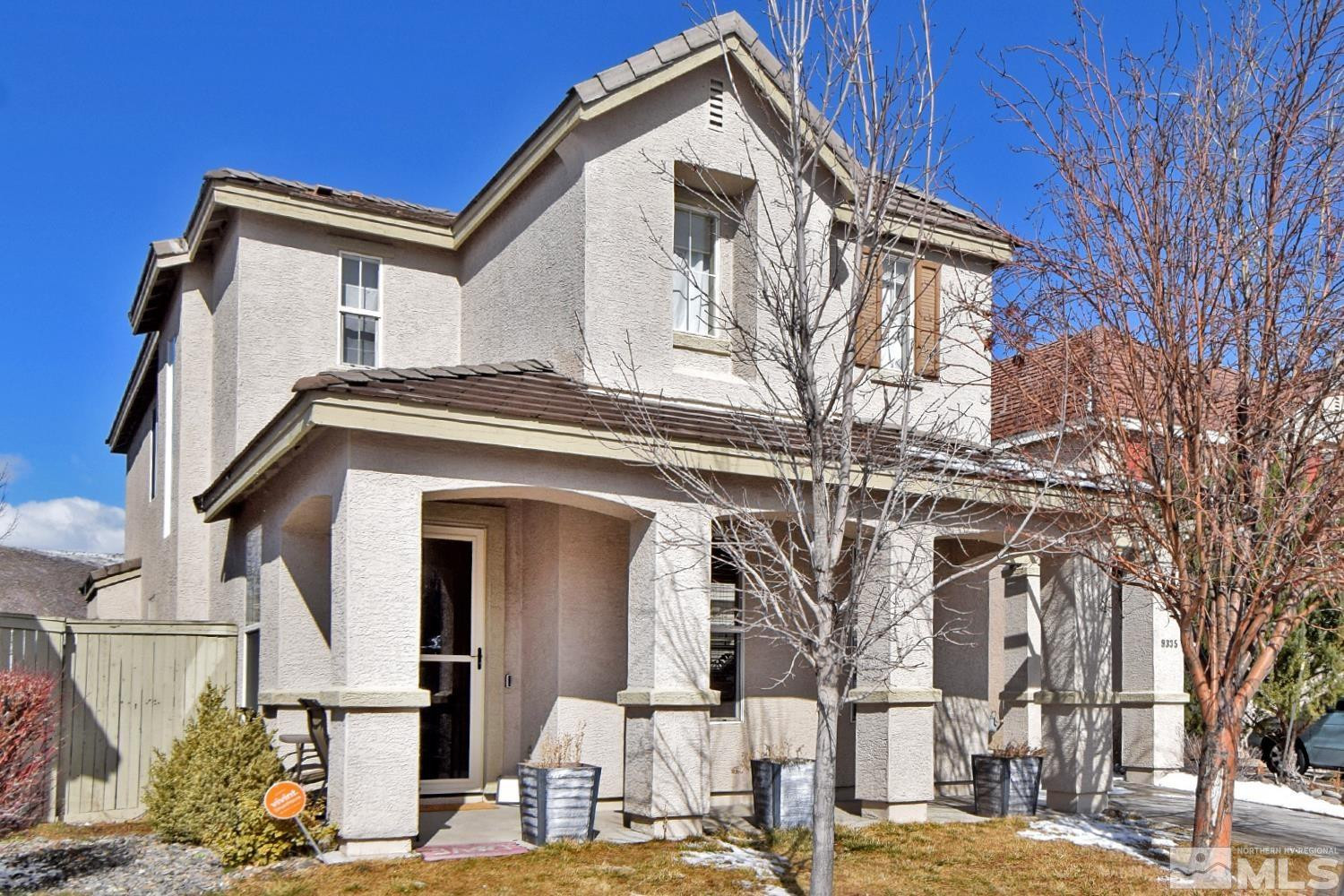 9335 Hummer Court Reno, NV 89521 - Photo 23 of 24 a front view of a house with a street