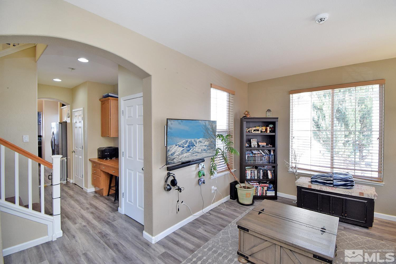 9335 Hummer Court Reno, NV 89521 - Photo 8 of 24 a living room with furniture and a flat screen tv