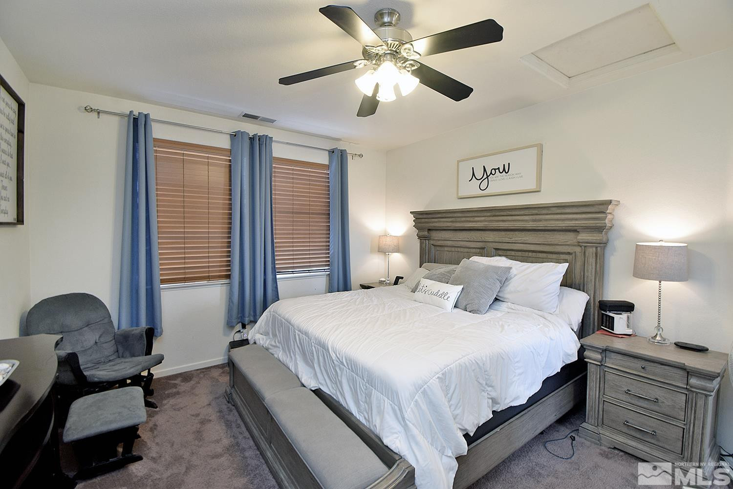 9335 Hummer Court Reno, NV 89521 - Photo 10 of 24 a bedroom with a bed and furniture