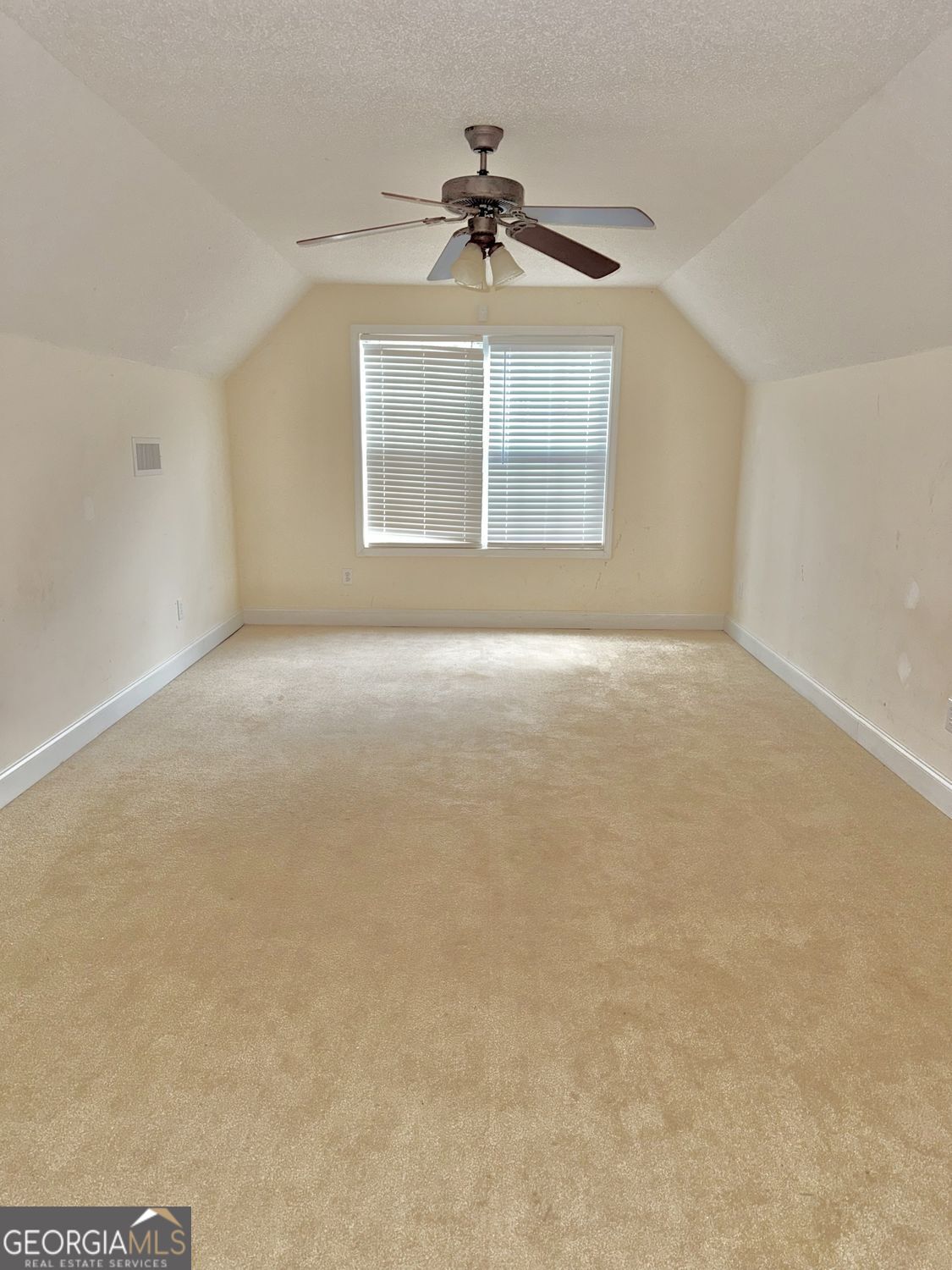 229 Lite-N-Tie Road Gray, GA 31032 - Photo 16 of 21 a view of an empty room with a window