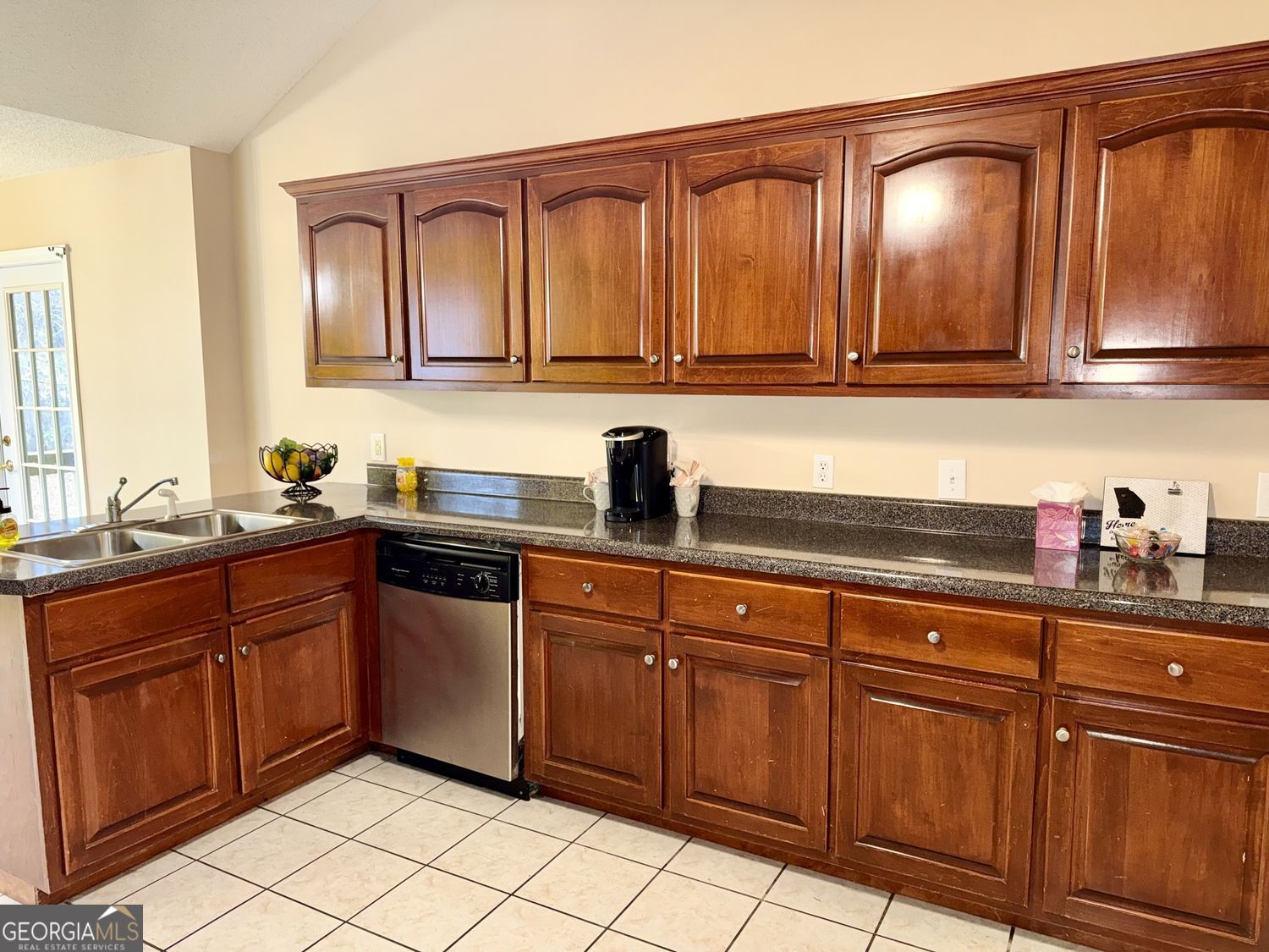 229 Lite-N-Tie Road Gray, GA 31032 - Photo 8 of 21 a kitchen with stainless steel appliances granite countertop a sink and cabinets