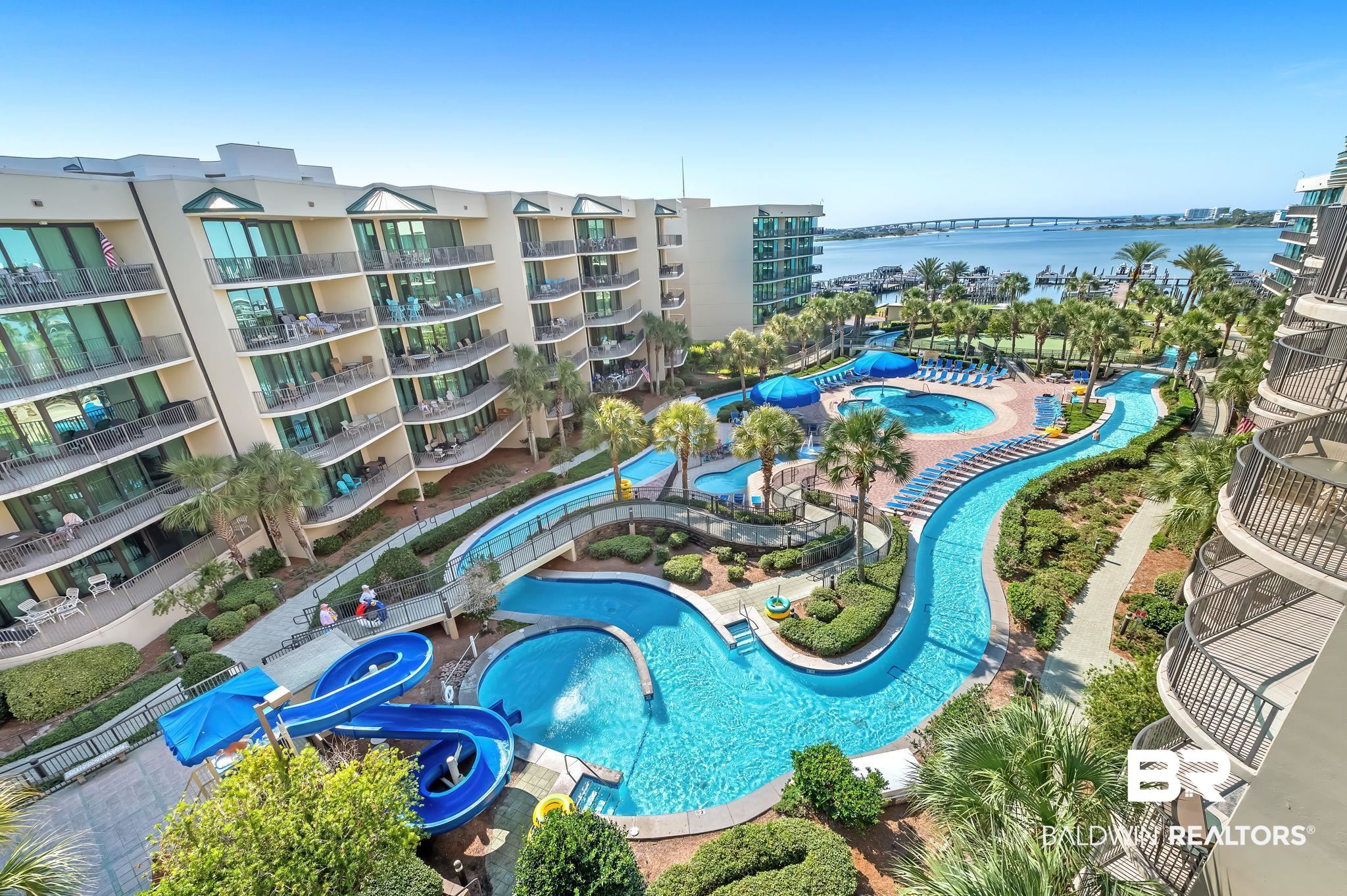 27580 Canal Road, Unit 1214 AND BOAT SLIP #62 Orange Beach, AL 36561 - Photo 1 of 67 Birds eye view of property with a water view
