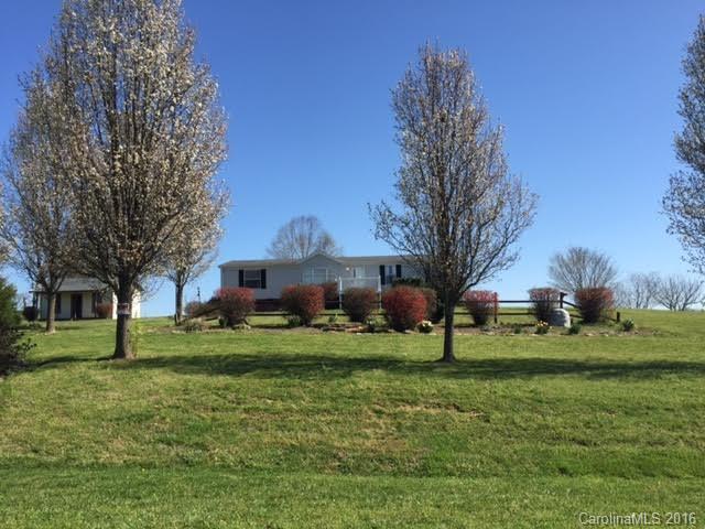 4365 Tite Road Stanfield, NC 28163 - Photo 1 of 22 a view of a house with a yard