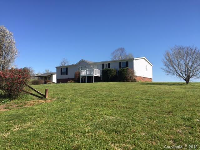 4365 Tite Road Stanfield, NC 28163 - Photo 2 of 22 a front view of a house with a yard