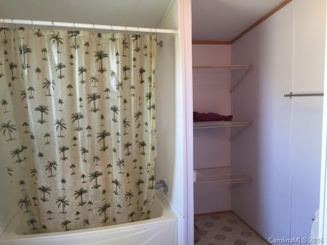 4365 Tite Road Stanfield, NC 28163 - Photo 15 of 22 a bathroom with a shower
