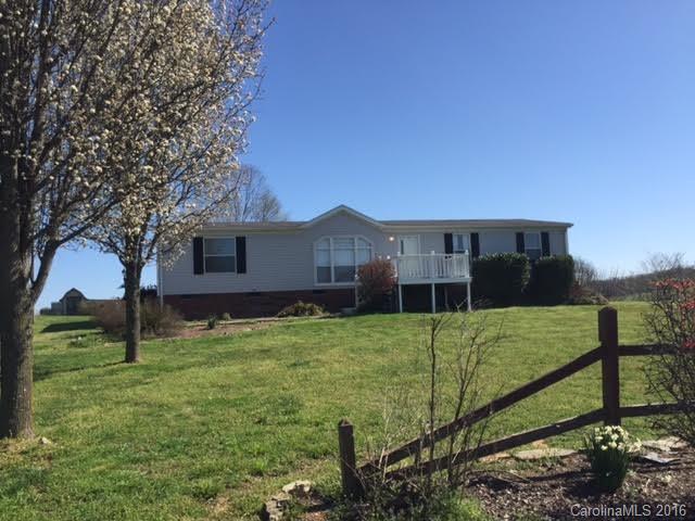 4365 Tite Road Stanfield, NC 28163 - Photo 3 of 22 a view of a house with a yard