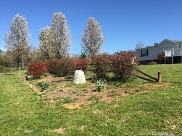 4365 Tite Road Stanfield, NC 28163 - Photo 5 of 22 a view of a tiny house with a yard