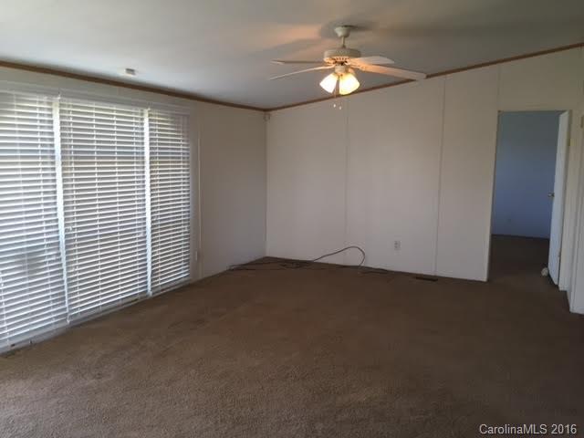 4365 Tite Road Stanfield, NC 28163 - Photo 10 of 22 an empty room with windows