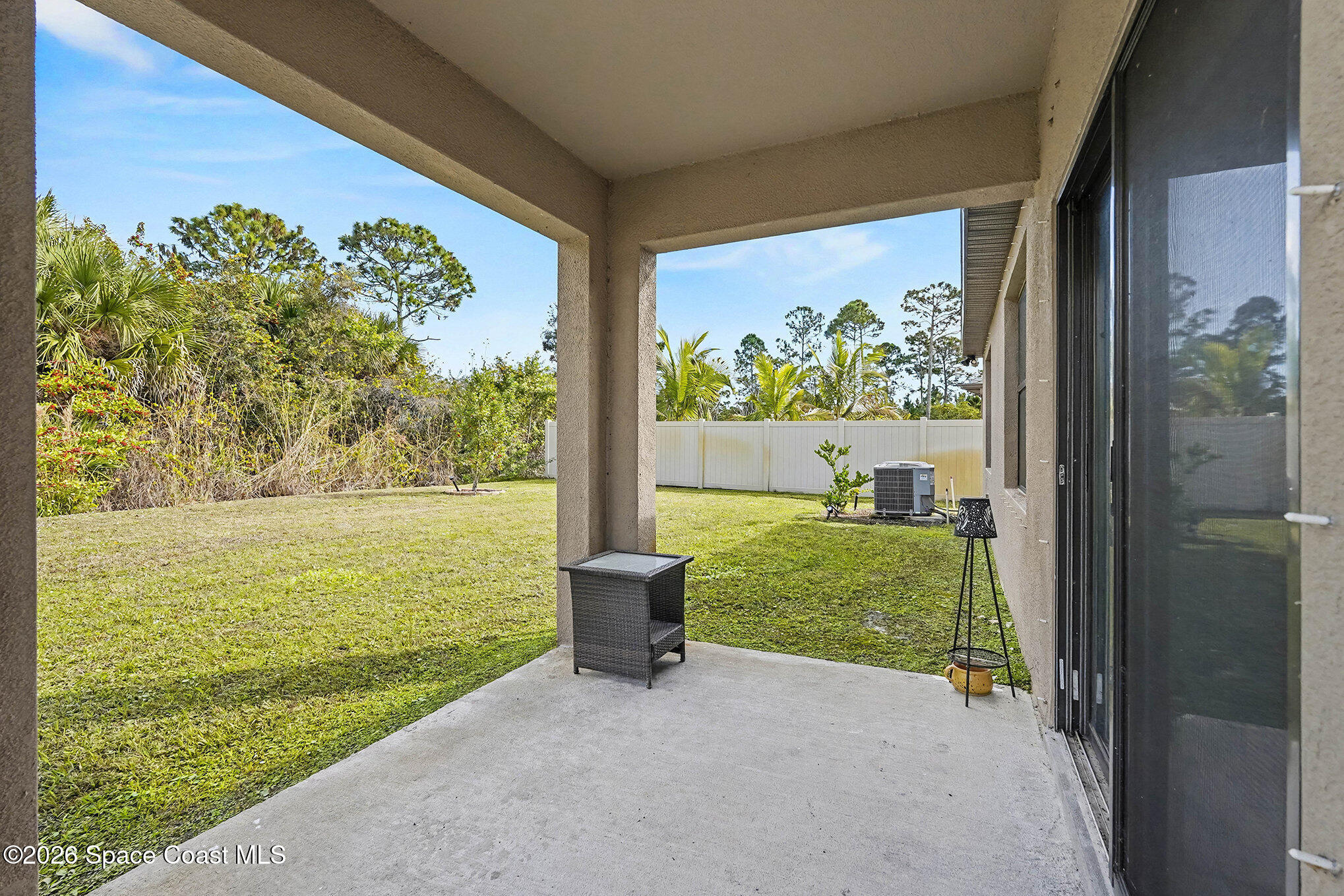 543 Old Country Rd S East Palm Bay, FL 32909 - Photo 17 of 21 a view of a garden with an outdoor space