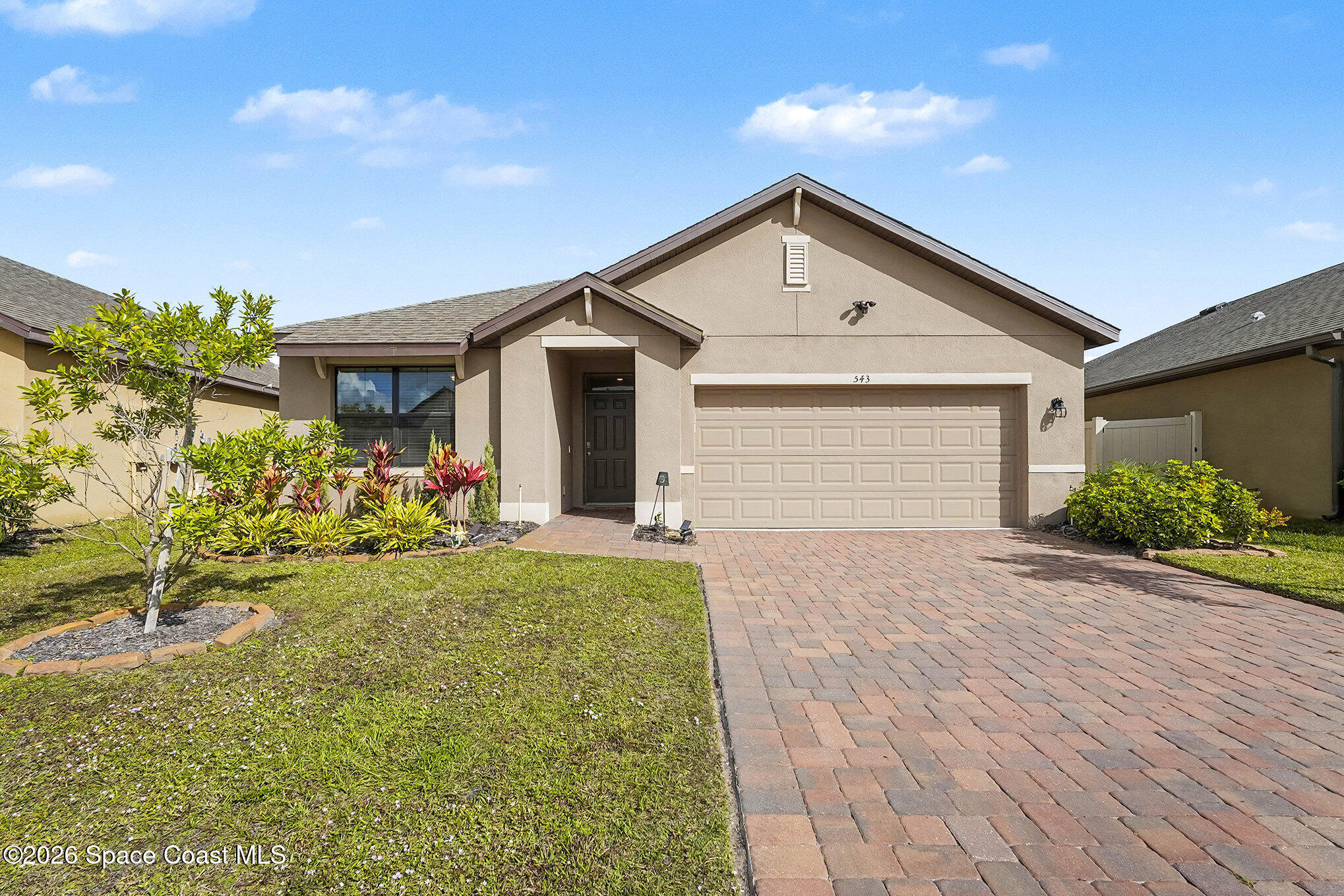 543 Old Country Rd S East Palm Bay, FL 32909 - Photo 2 of 21 a view of a house with a yard