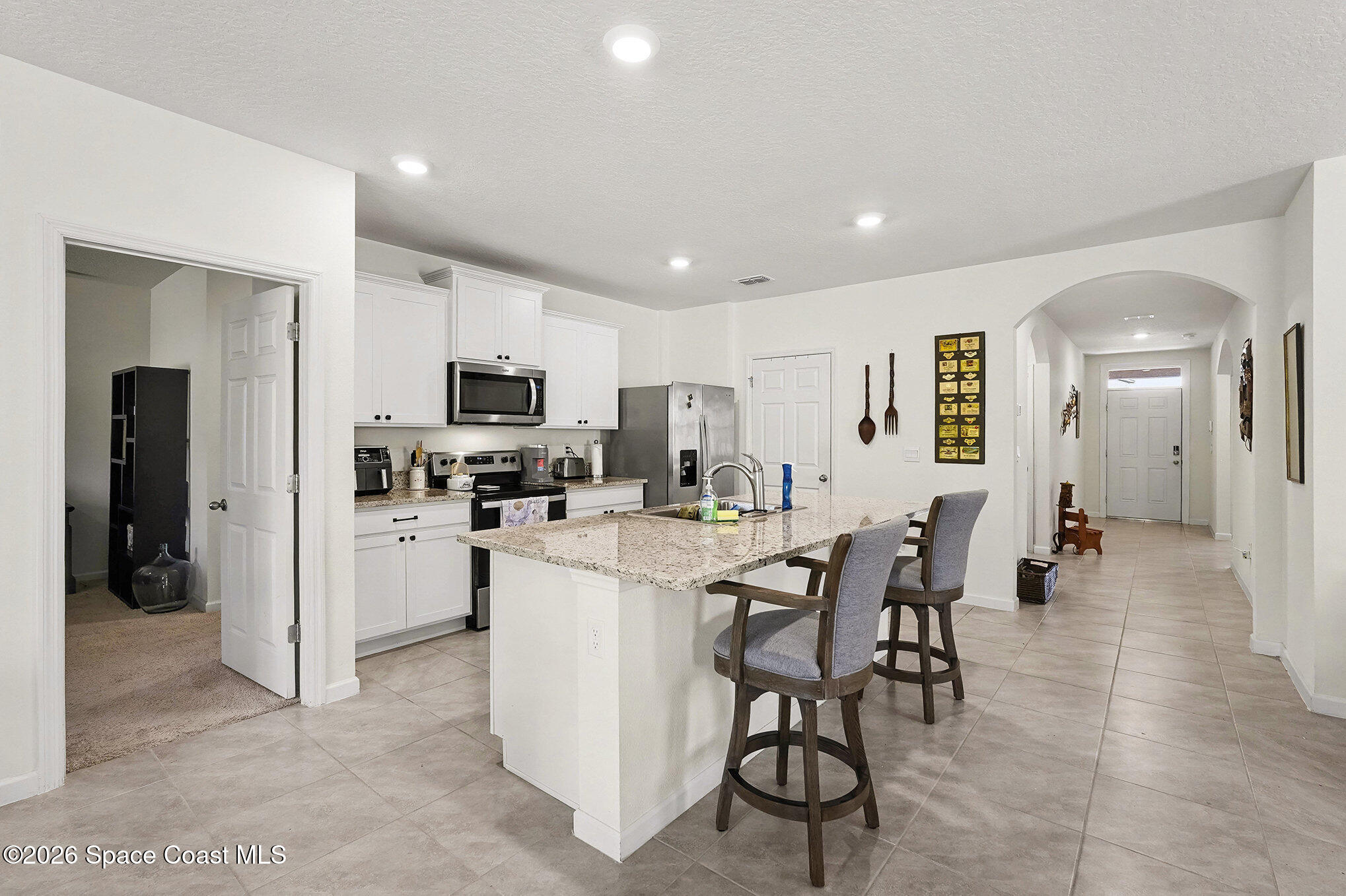 543 Old Country Rd S East Palm Bay, FL 32909 - Photo 6 of 21 a view of a dining area with furniture