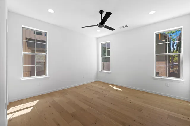 a view of empty room with windows