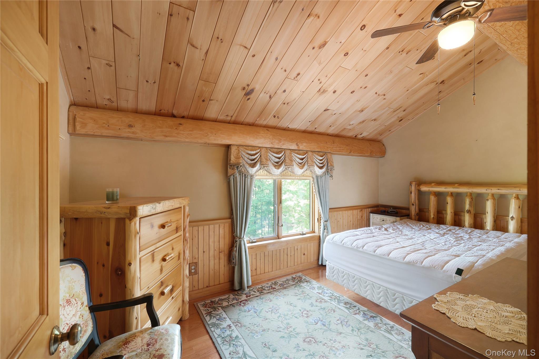 25 Cauthers Road Fallsburg, NY 12789 - Photo 24 of 27 a bedroom with a bed window and bathroom