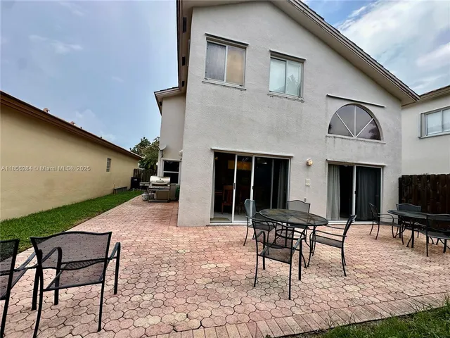 $684,900 | 9942 Northwest 29th Street, Doral, FL 33172