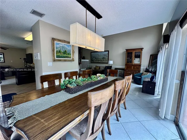 $684,900 | 9942 Northwest 29th Street, Doral, FL 33172