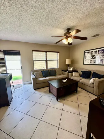 $684,900 | 9942 Northwest 29th Street, Doral, FL 33172