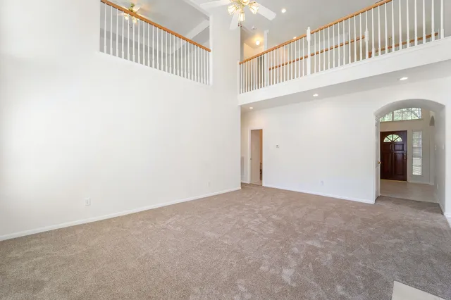 a view of an entryway with a hallway