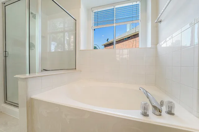 a bathroom with bathtub