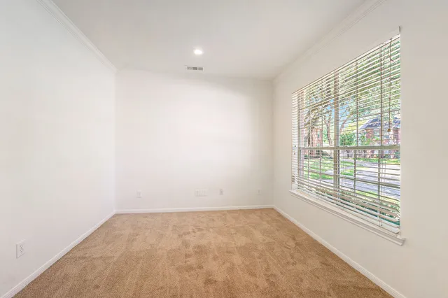 an empty room with a window