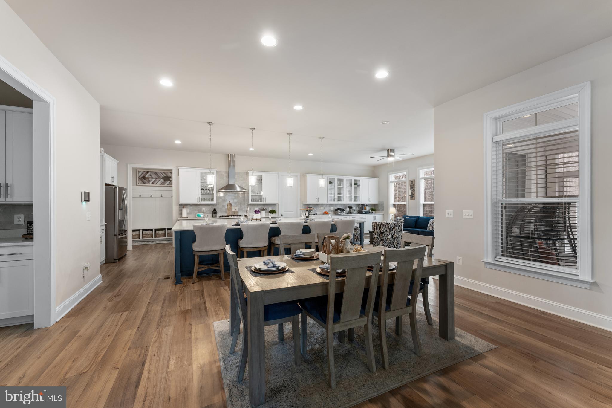 13882 Trinity Pond Lane Manassas, VA 20112 - Photo 22 of 69 a view of a dining room with furniture