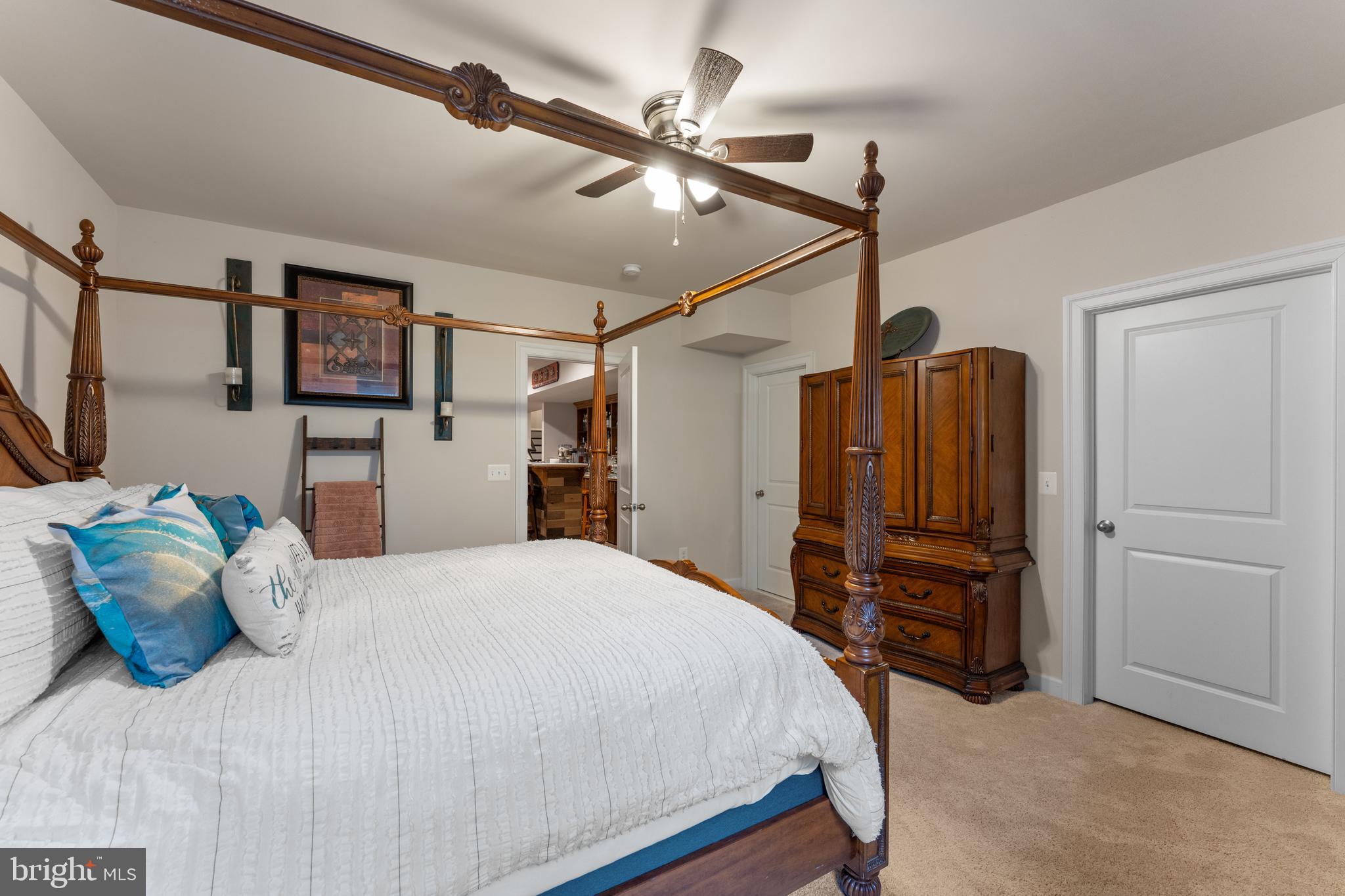 13882 Trinity Pond Lane Manassas, VA 20112 - Photo 28 of 69 a bedroom with a bed and a closet
