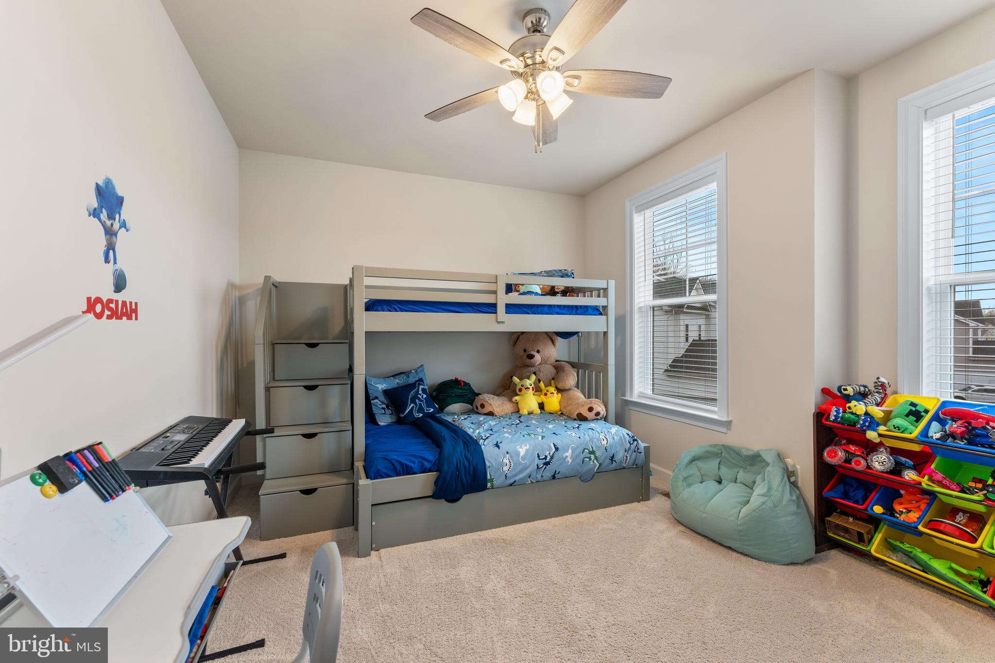 13882 Trinity Pond Lane Manassas, VA 20112 - Photo 34 of 69 a bedroom with bed and a window