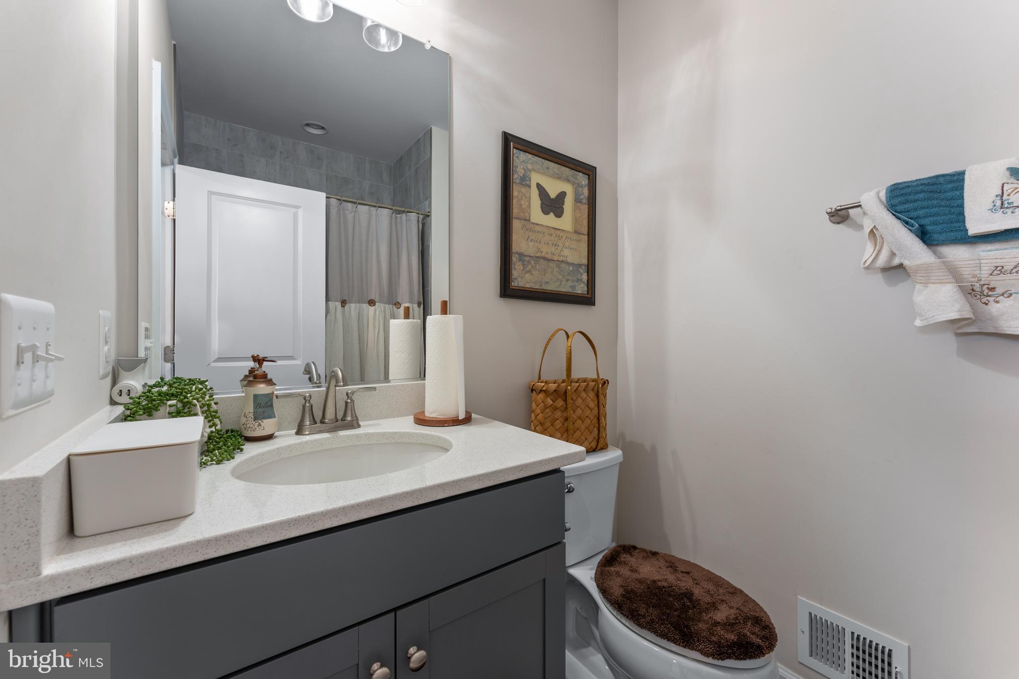 13882 Trinity Pond Lane Manassas, VA 20112 - Photo 38 of 69 a bathroom with a sink and a toilet