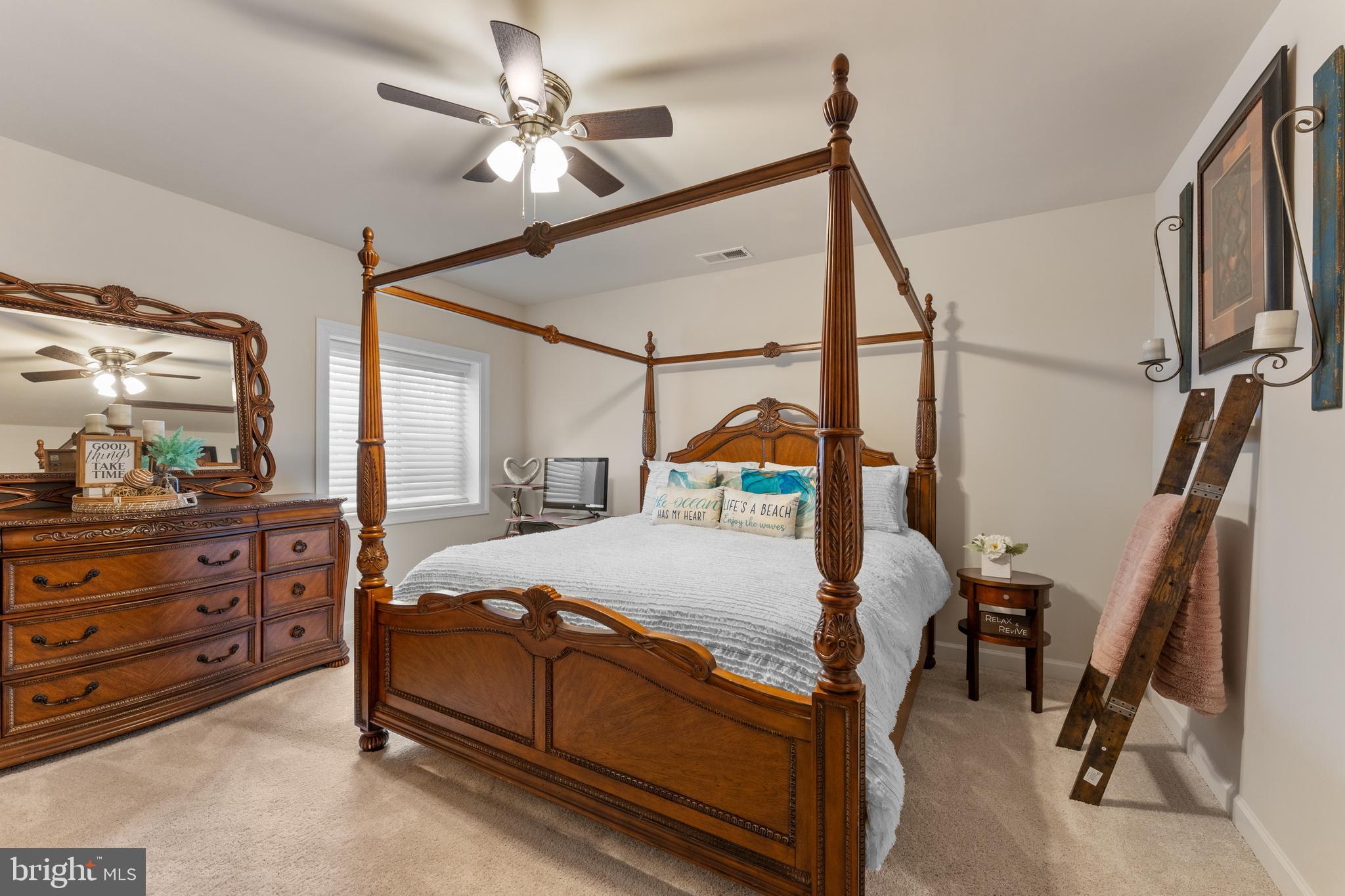 13882 Trinity Pond Lane Manassas, VA 20112 - Photo 54 of 69 a bedroom with a bed and a mirror on the dresser