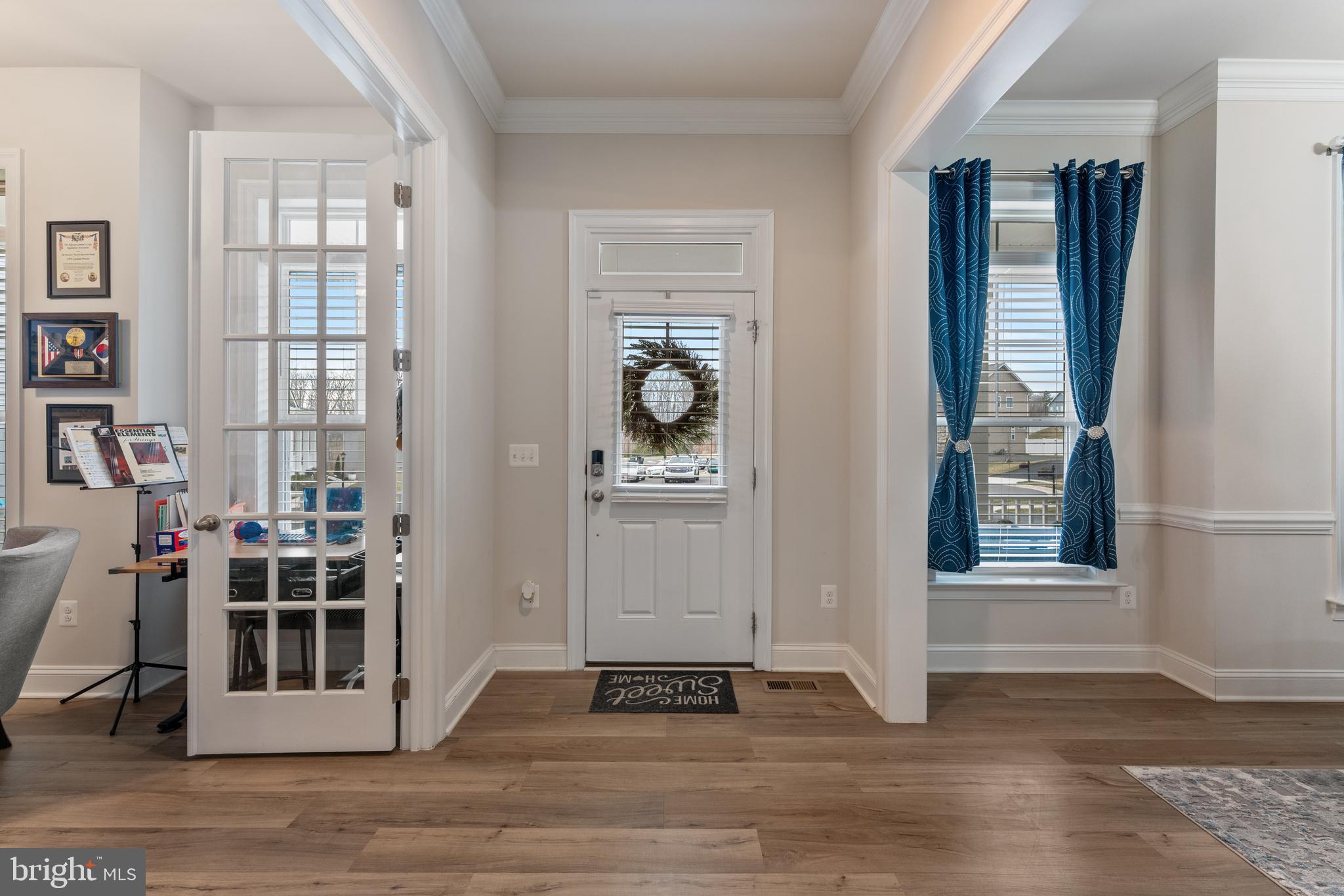 13882 Trinity Pond Lane Manassas, VA 20112 - Photo 8 of 69 a view of a livingroom with wooden floor and a window