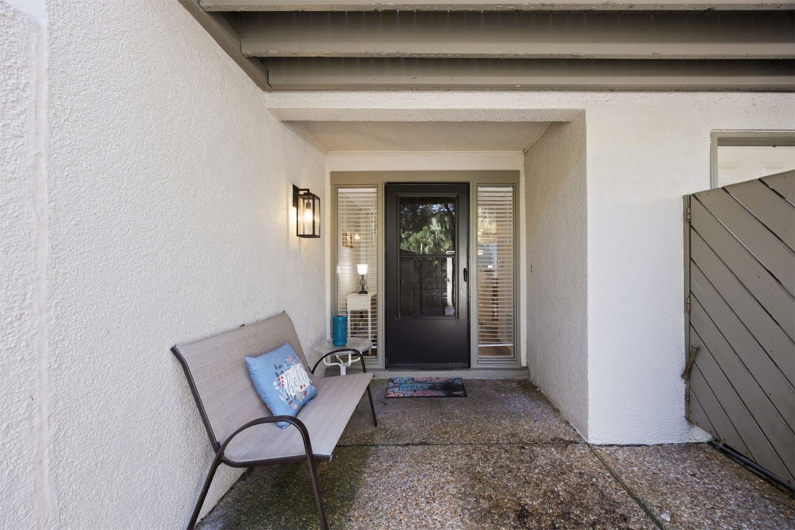 3012 Sea Marsh Road, Unit 3012 Fernandina Beach, FL 32034 - Photo 11 of 54 a view of a livingroom with furniture and front door