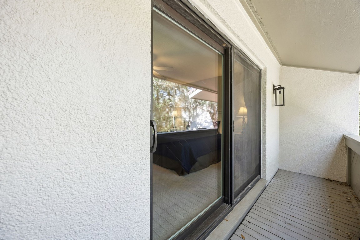 3012 Sea Marsh Road, Unit 3012 Fernandina Beach, FL 32034 - Photo 34 of 54 a view of a glass door and the balcony