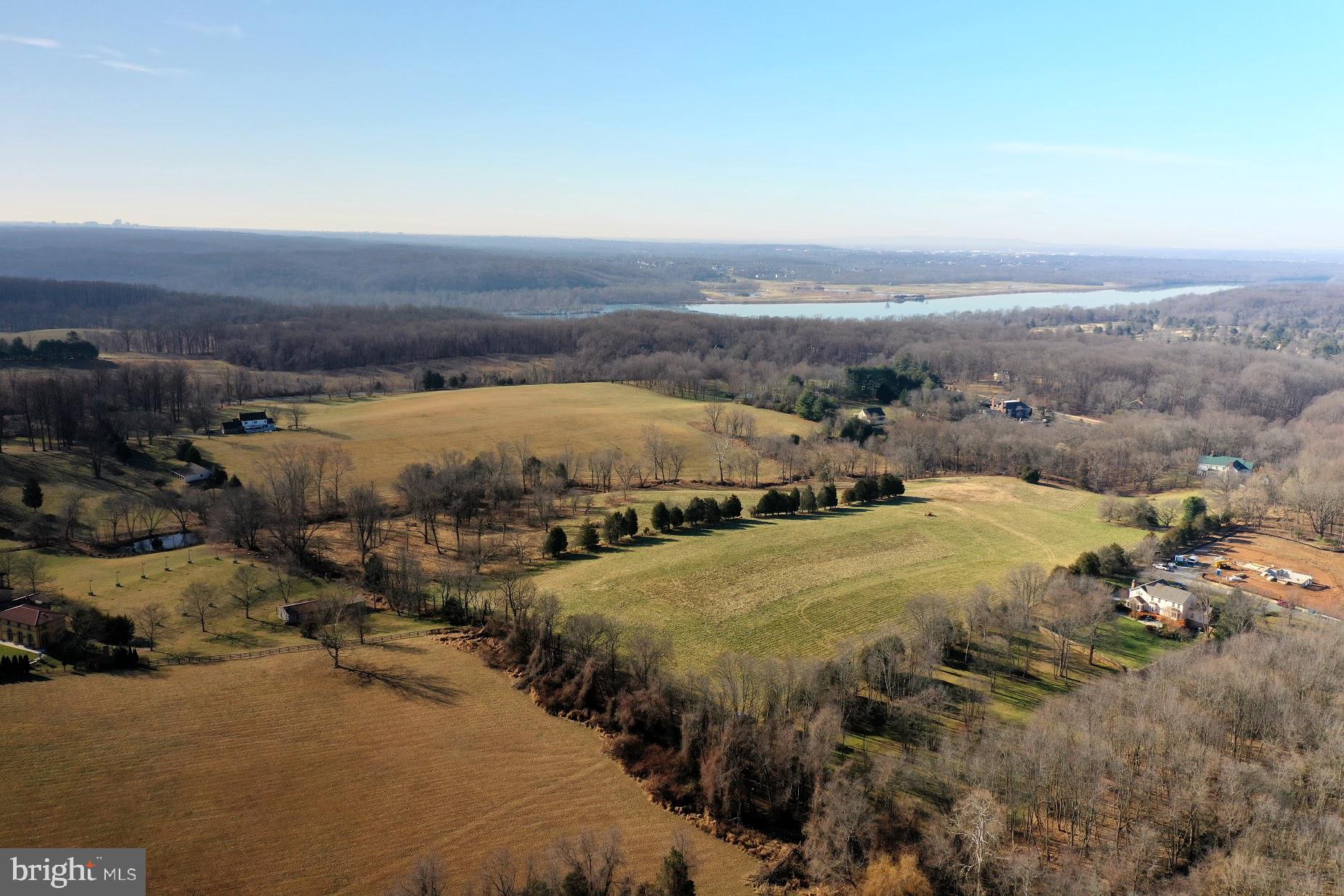 15220 River Road Potomac, MD 20854 - Photo 4 of 11 an aerial view of residential houses with outdoor space