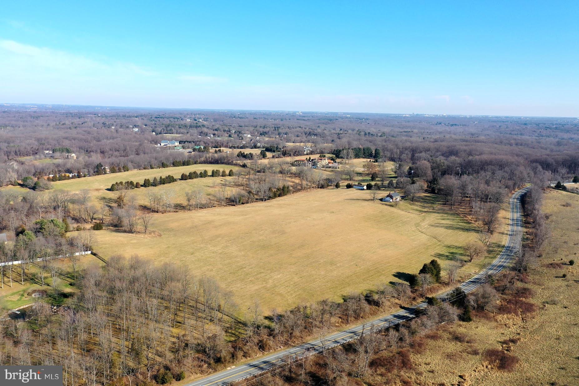 15220 River Road Potomac, MD 20854 - Photo 8 of 11 an aerial view of residential houses with outdoor space