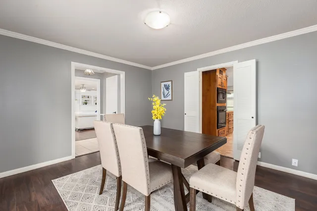 a kitchen with stainless steel appliances a stove sink and microwave