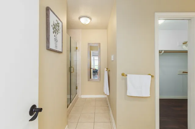 a bathroom with a sink double vanity and a mirror