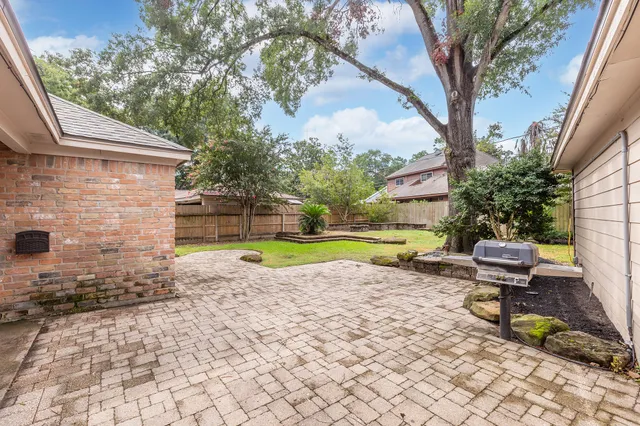 a view of a backyard with a garden